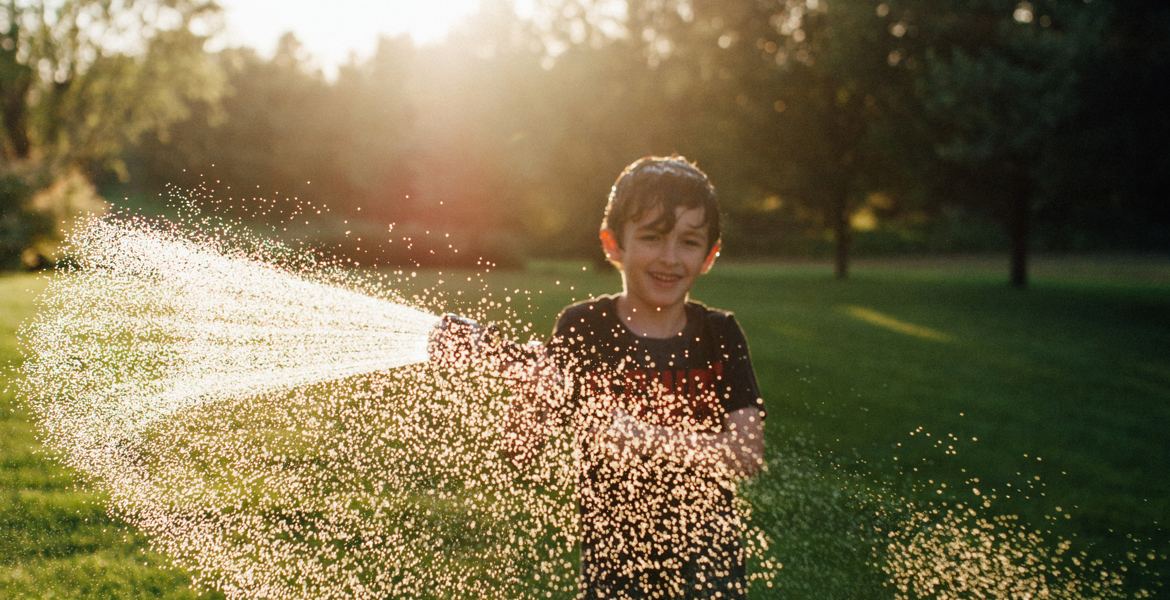 Boy with hose